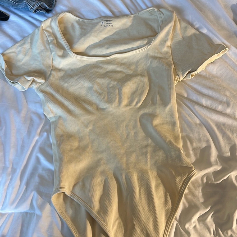 cream body suit